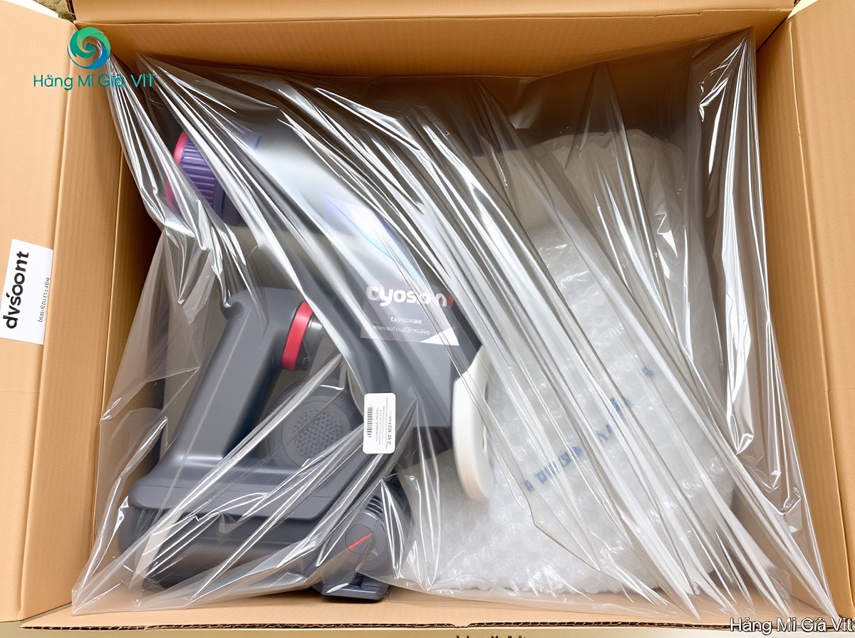 Professional package being sealed: Dyson V8 Extra in original box, inside cardbo